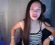 ur_hot_asian is a  year old female webcam sex model.