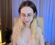 ellagi is a 19 year old female webcam sex model.