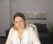 milana_blake is a 44 year old female webcam sex model.