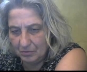 exquisitemature is a 52 year old female webcam sex model.