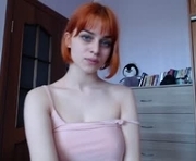 redhead_rabbit is a  year old female webcam sex model.