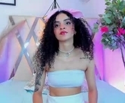 curlyrose_ is a 19 year old female webcam sex model.