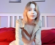 lusty_red is a 18 year old female webcam sex model.