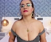 marilynvega77 is a 40 year old female webcam sex model.