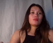 pinay_blossom is a  year old female webcam sex model.