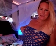 mjcoconut is a 46 year old female webcam sex model.