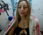 desire_latin is a 58 year old female webcam sex model.