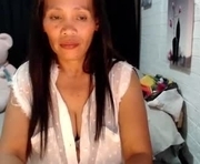 pinaymom69xx is a  year old female webcam sex model.